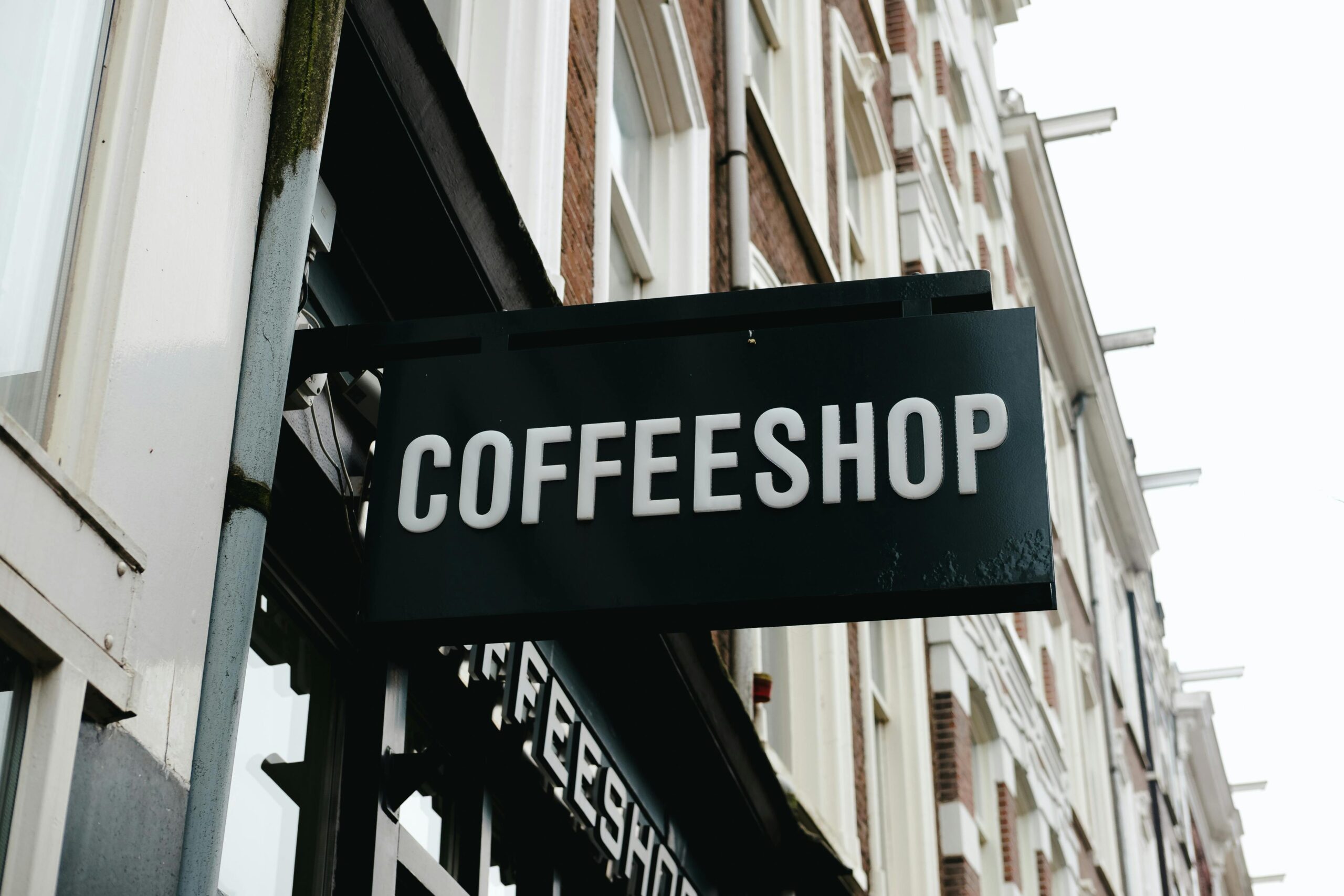 Durable ACM and powder-coated metal outdoor business signs withstanding harsh weather conditions